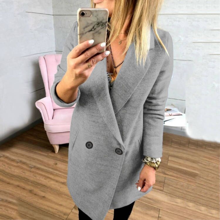 Women's extra-long, tailored coat with elegant lapels and practical pockets NOVAE