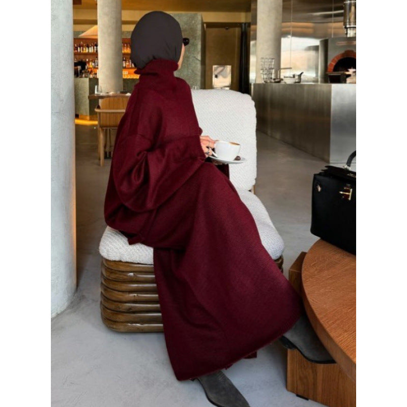 Women's knit dress with high collar and wide silhouette NOVAE