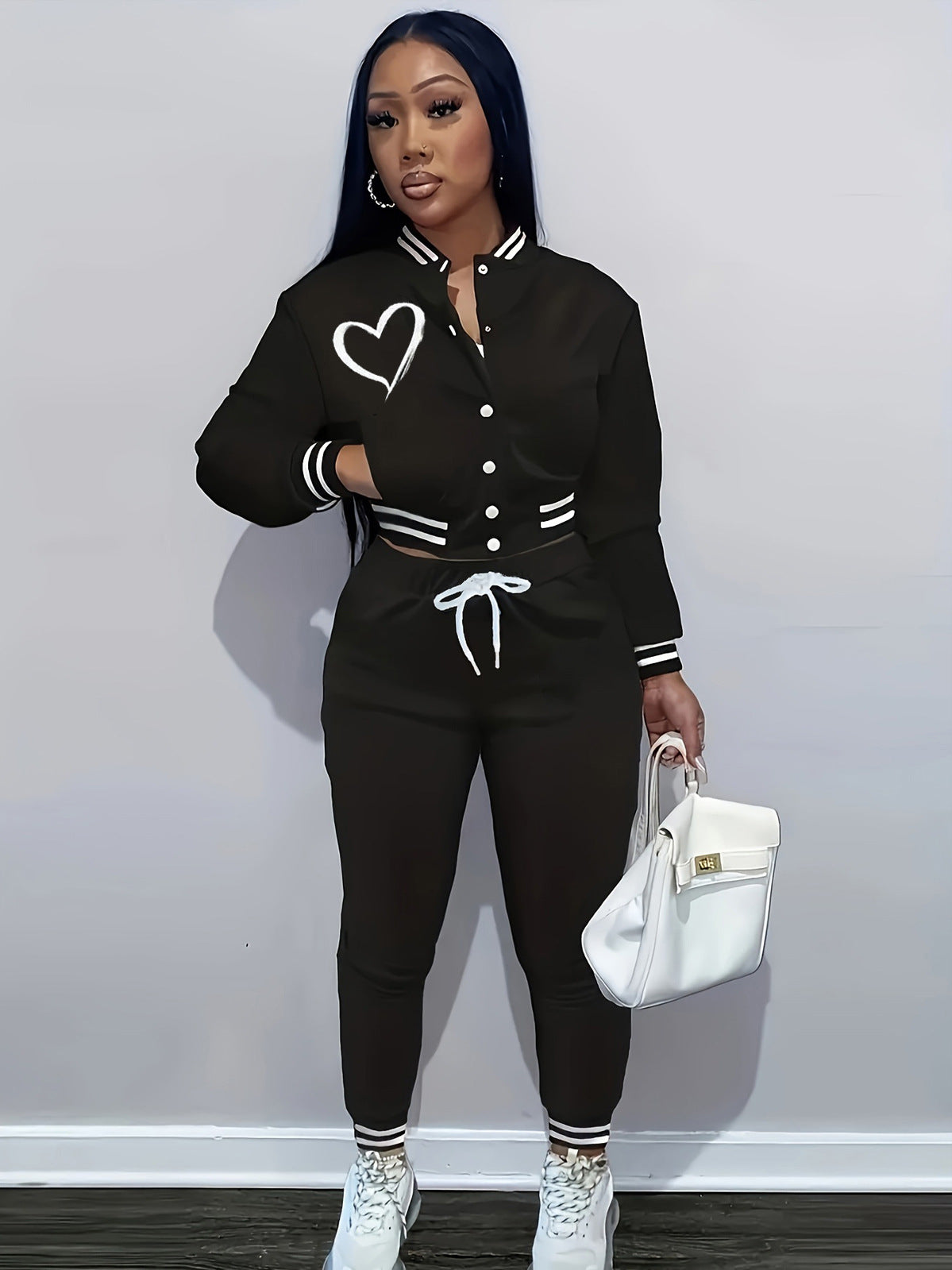 Women's tracksuit with fashionable cut and practical pockets NOVAE