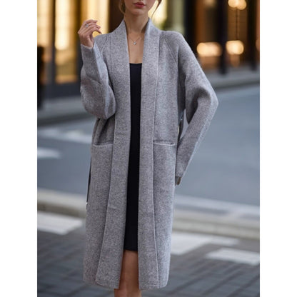 Women's long knitted coat with open cut and practical pockets NOVAE