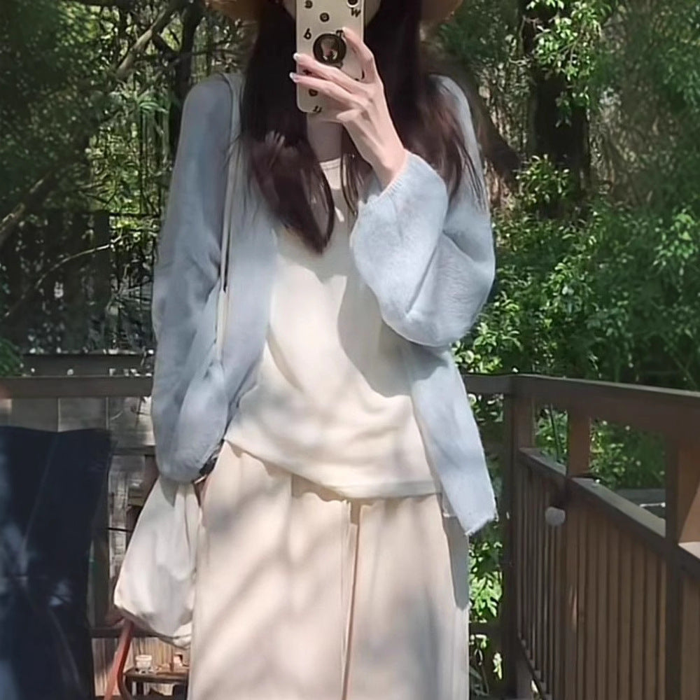 Women's fluffy cardigan with a relaxed fit and soft sleeves NOVAE