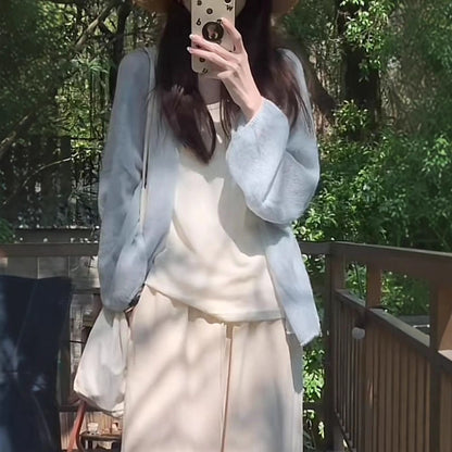 Women's fluffy cardigan with a relaxed fit and soft sleeves NOVAE