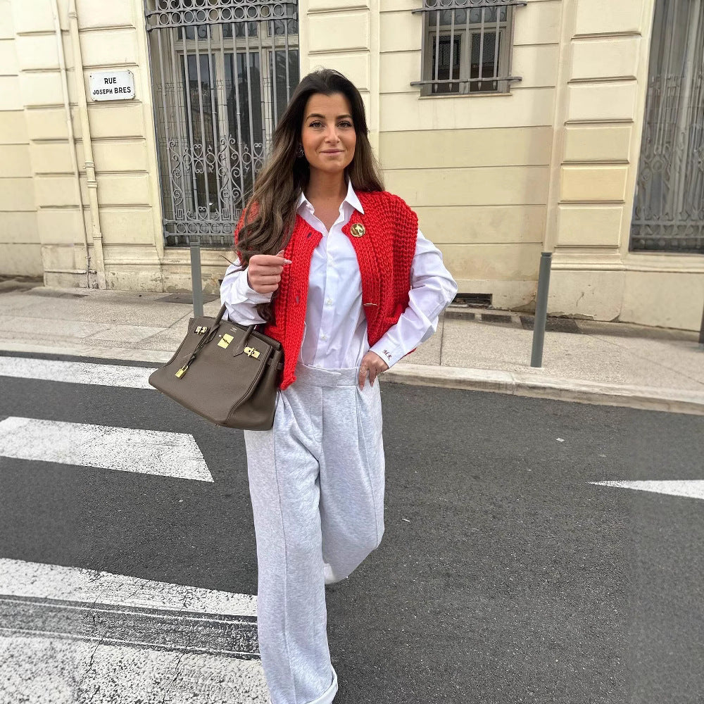 Women's knitted vest with decorative button closure NOVAE