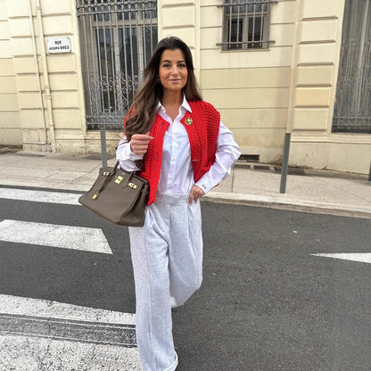 Women's knitted vest with decorative button closure NOVAE