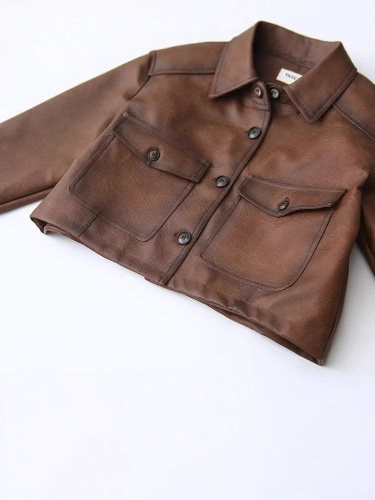 Women's cropped leather jacket with practical chest pockets and button details NOVAE
