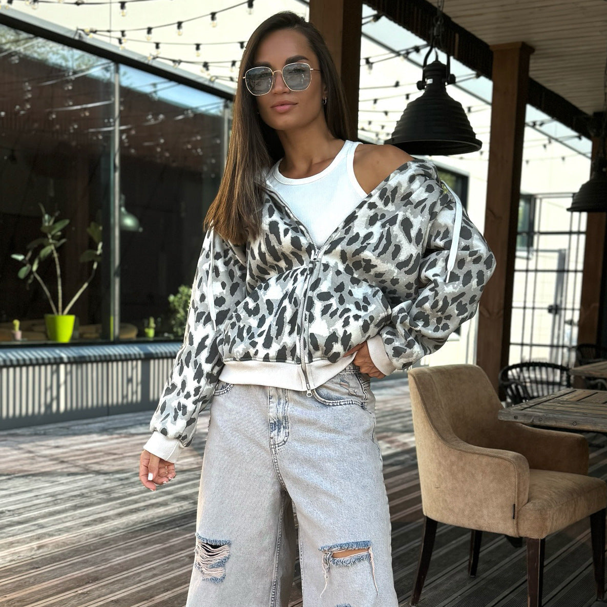 Women's hooded jacket with modern animal print and practical pockets NOVAE