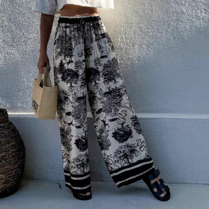 Women's wide-leg palazzo trousers with floral pattern and elasticated waistband NOVAE