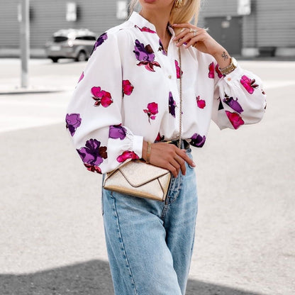 Women's elegant blouse with floral pattern and striking puff sleeves NOVAE