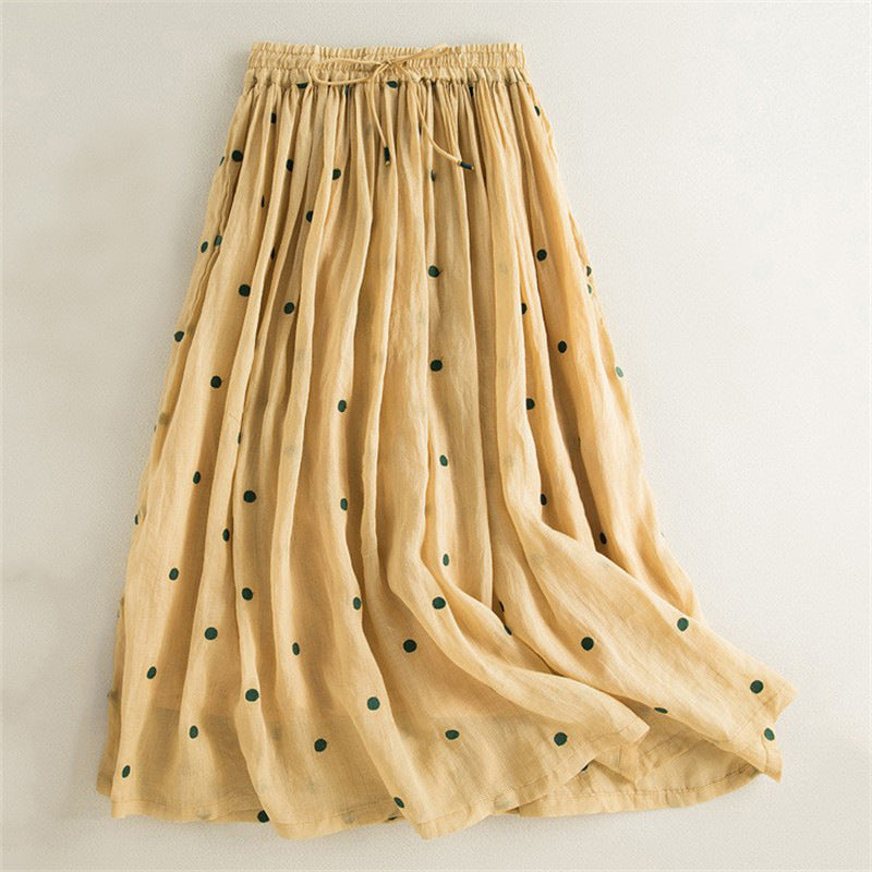 Women's long, airy skirt with elastic waistband and polka dot design NOVAE
