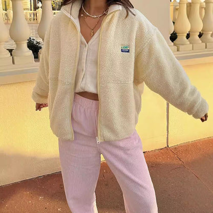 Women's plush jacket with high collar and side pockets NOVAE