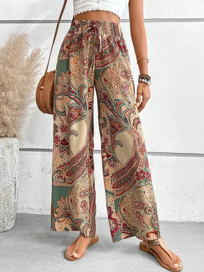 Women's wide-leg palazzo trousers with floral paisley pattern and elasticated waistband NOVAE
