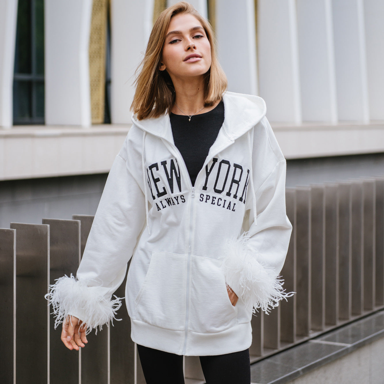 Women's oversized hoodie with creative lettering and modern fringe NOVAE