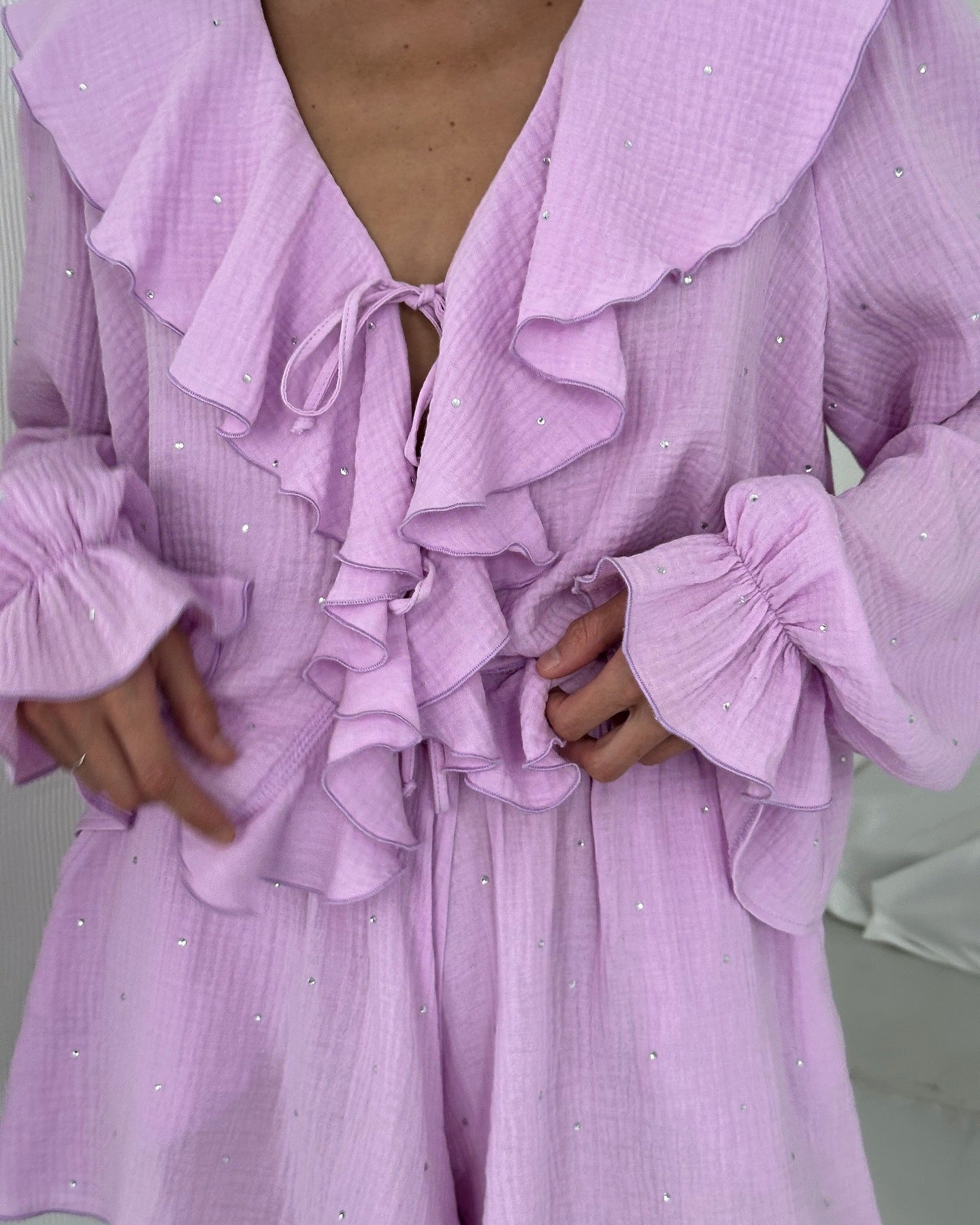 Women's blouse with voluminous ruffles and glitter details NOVAE