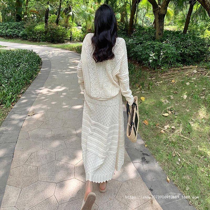 Women's knit dress with fine openwork pattern and elegant button details NOVAE