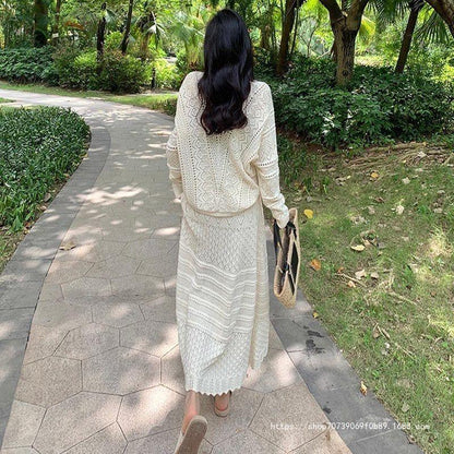 Women's knit dress with fine openwork pattern and elegant button details NOVAE