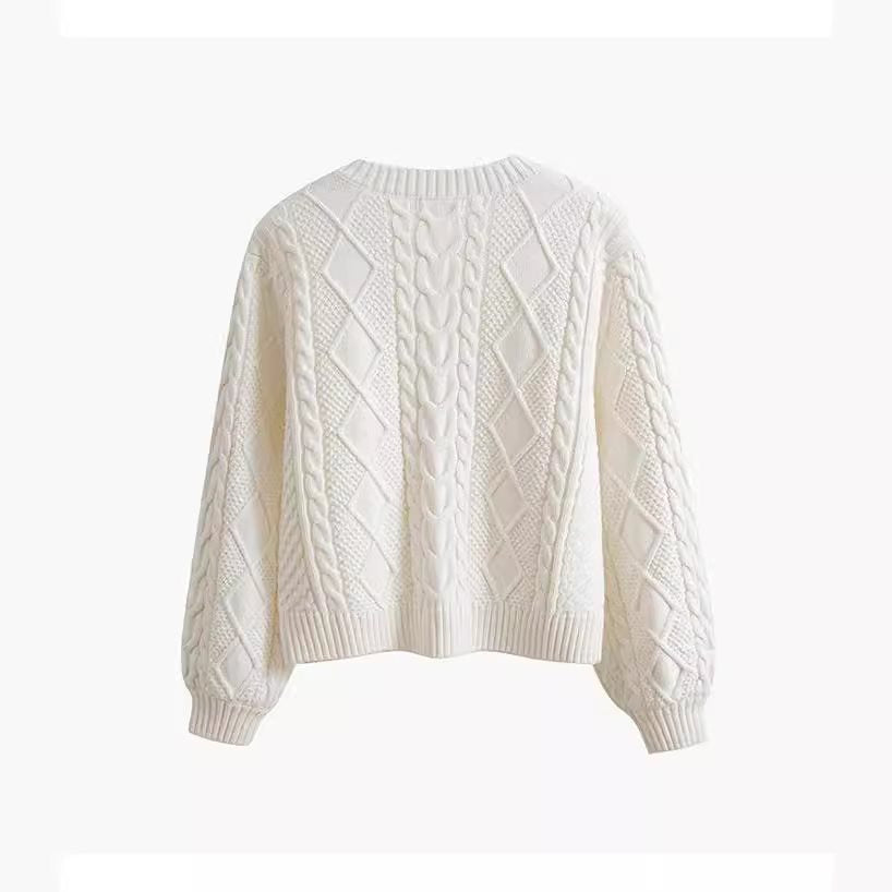 Women's chunky knit sweater with creative cable pattern and wide sleeves NOVAE
