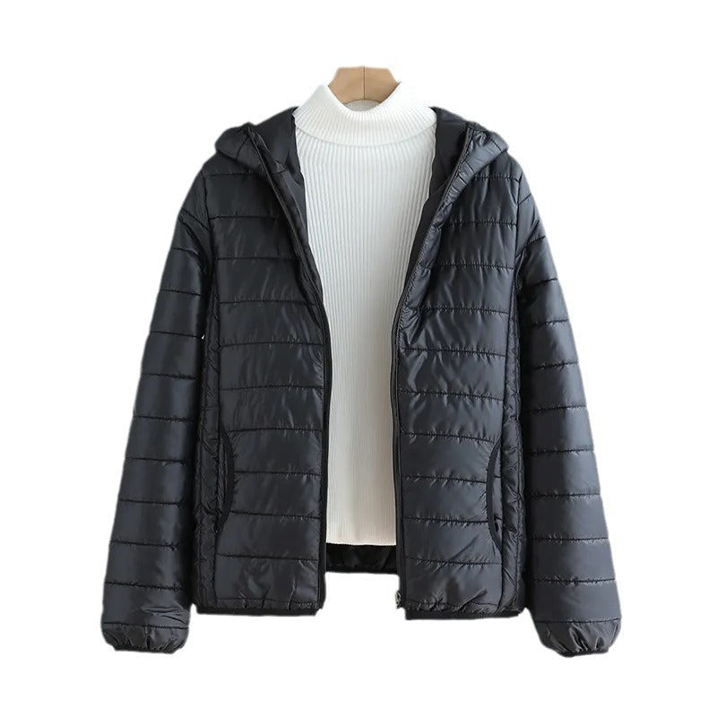 Women's quilted transitional jacket with practical pockets and hood NOVAE