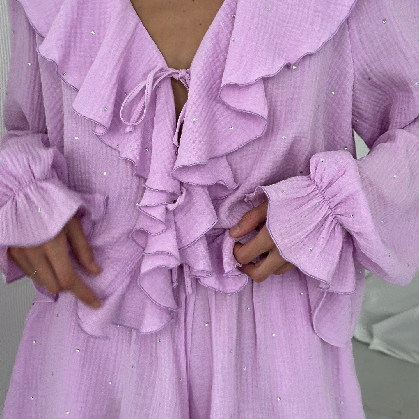 Women's blouse with voluminous ruffles and glitter details NOVAE