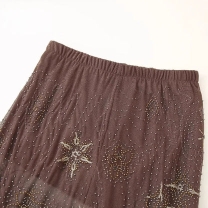 Women's elegant sheer palazzo pants with sparkling appliqués NOVAE