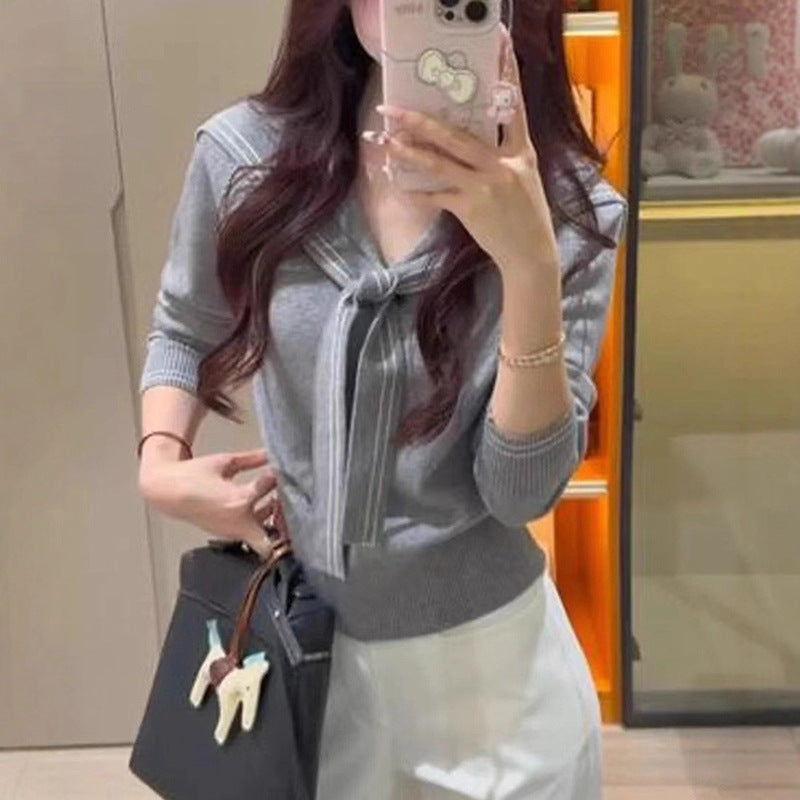 Women's stylish sweater with bow collar and fine knit structure NOVAE