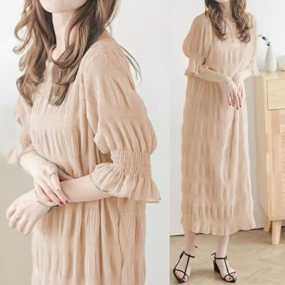 Women's casual maxi dress with elasticated puff sleeves and sophisticated textured design NOVAE