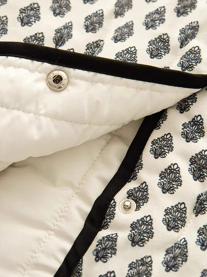 Women's quilted jacket with decorative pockets and modern print NOVAE