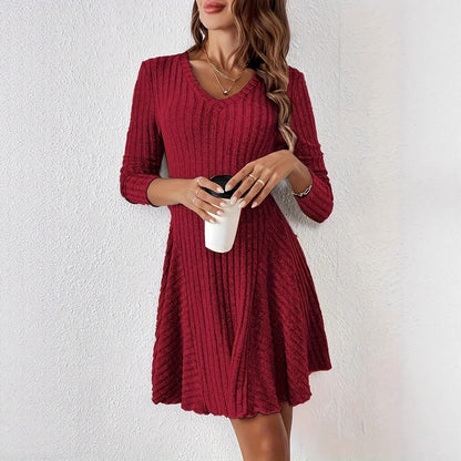 Women's V-neck dress with flared hem and long sleeves NOVAE