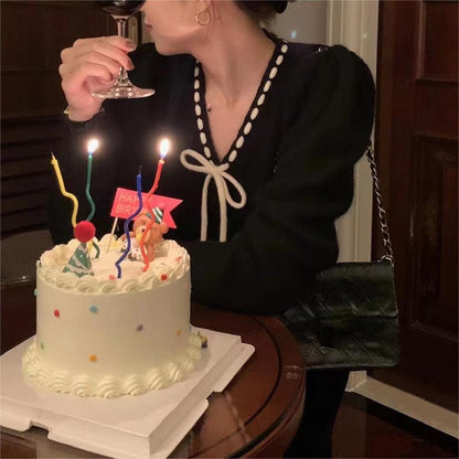 Women's cozy cardigan with contrasting buttons and elegant details NOVAE