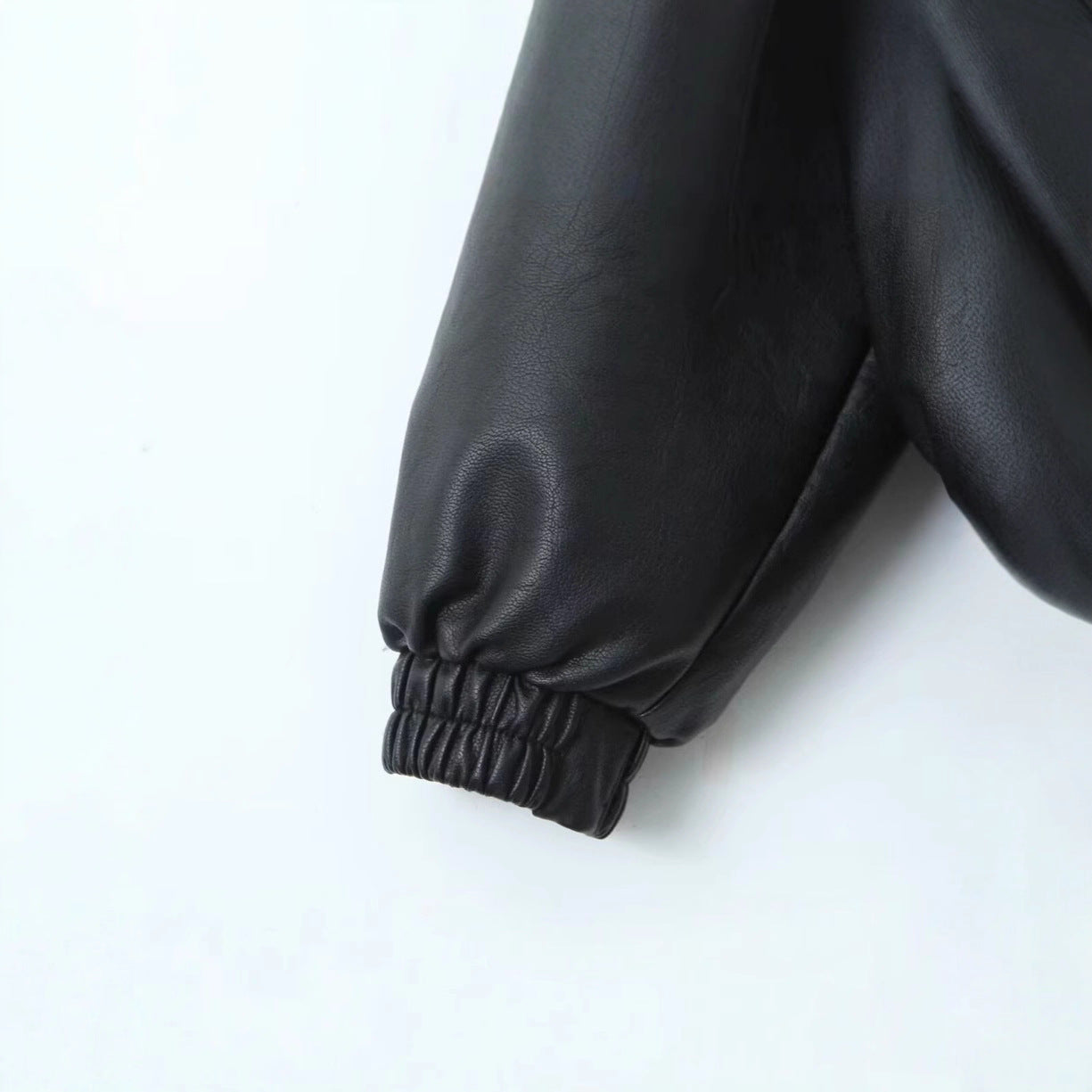 Women's casual leather jacket with elasticated hem and practical pockets NOVAE