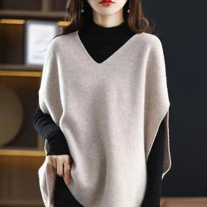 Women's knitted poncho with V-neck and elegant silhouette NOVAE