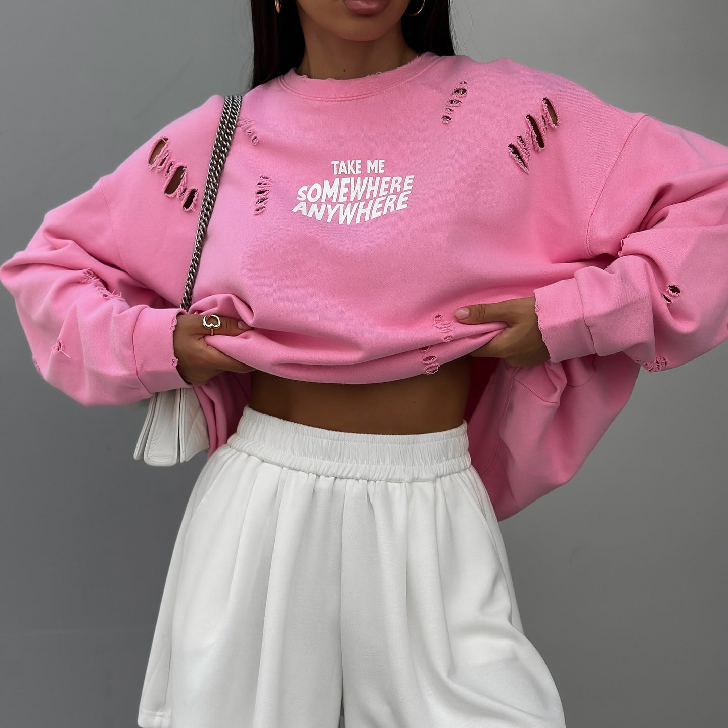 Women's casual oversized sweater with stylish ripped details NOVAE