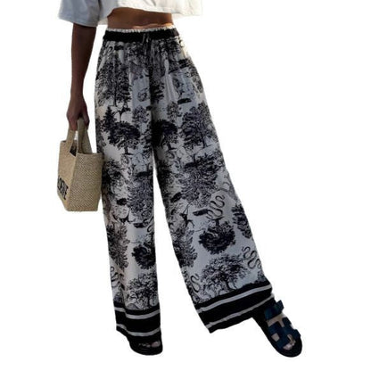 Women's wide-leg palazzo trousers with floral pattern and elasticated waistband NOVAE