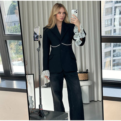 Women's elegant blazer jacket with a relaxed fit and striking sleeves NOVAE