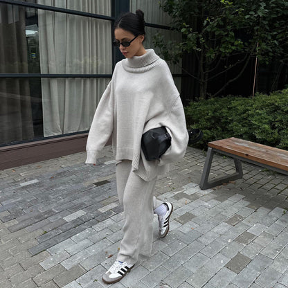 Women's comfortable knit suit with high collar and flared trousers NOVAE