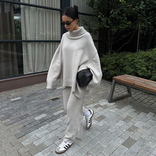 Women's comfortable knit suit with high collar and flared trousers NOVAE