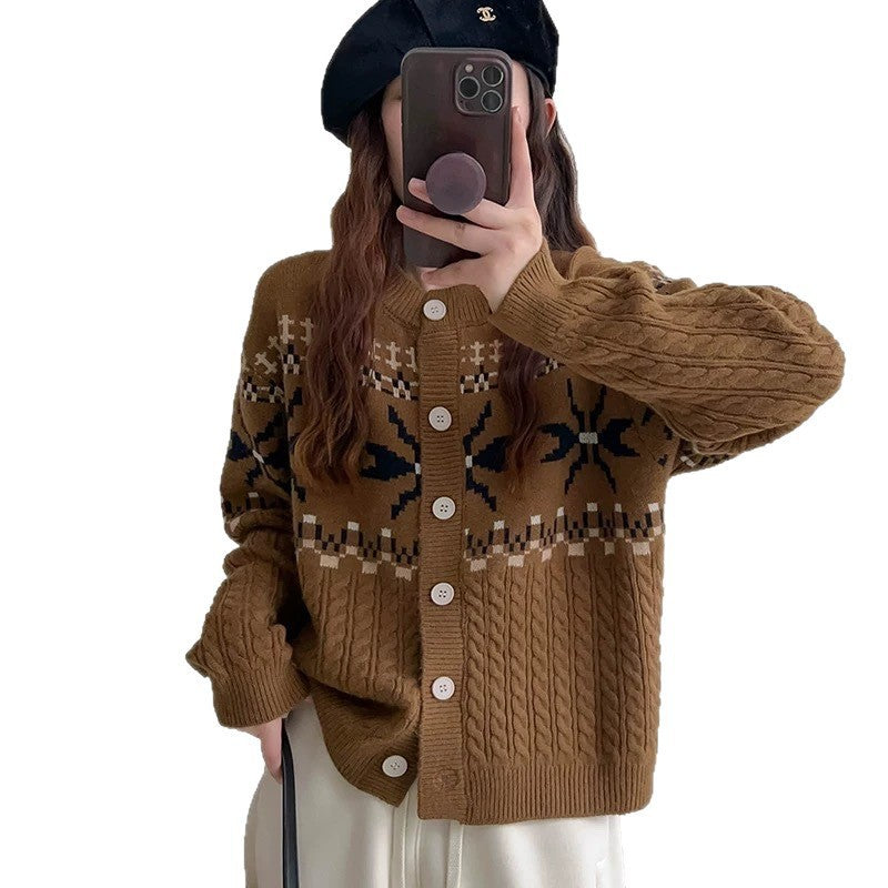 Women's chunky knit cardigan with decorative cable pattern and button details NOVAE