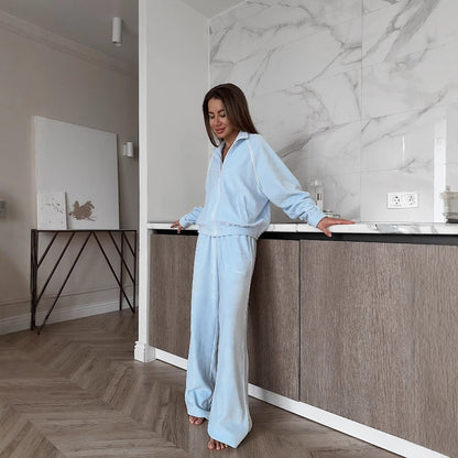 Women's leisure suit made of soft fleece with a high collar and practical pockets NOVAE