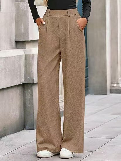 Women's wide-leg trousers with a high waistband and practical side pockets NOVAE
