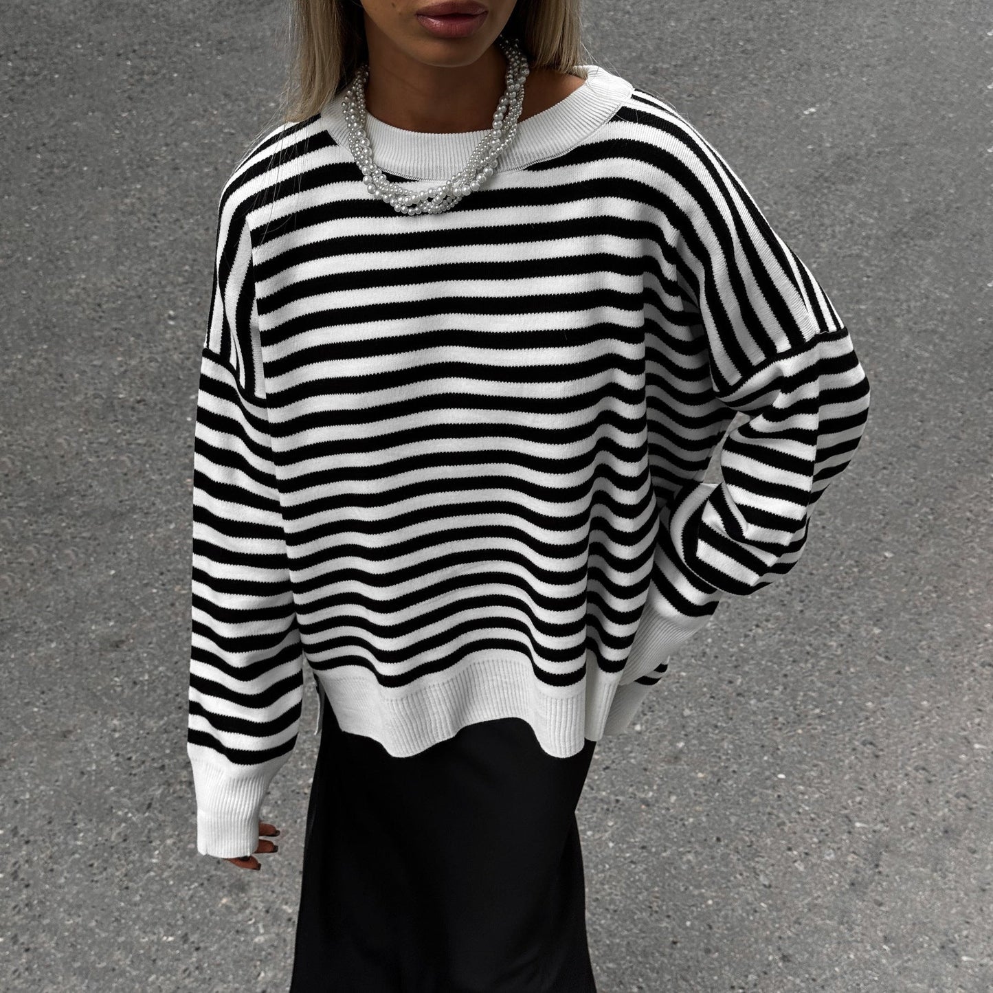 Women's striped sweater in a casual oversized style with wide sleeves NOVAE