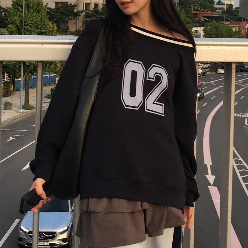 Women's casual oversized sweater with sporty print NOVAE
