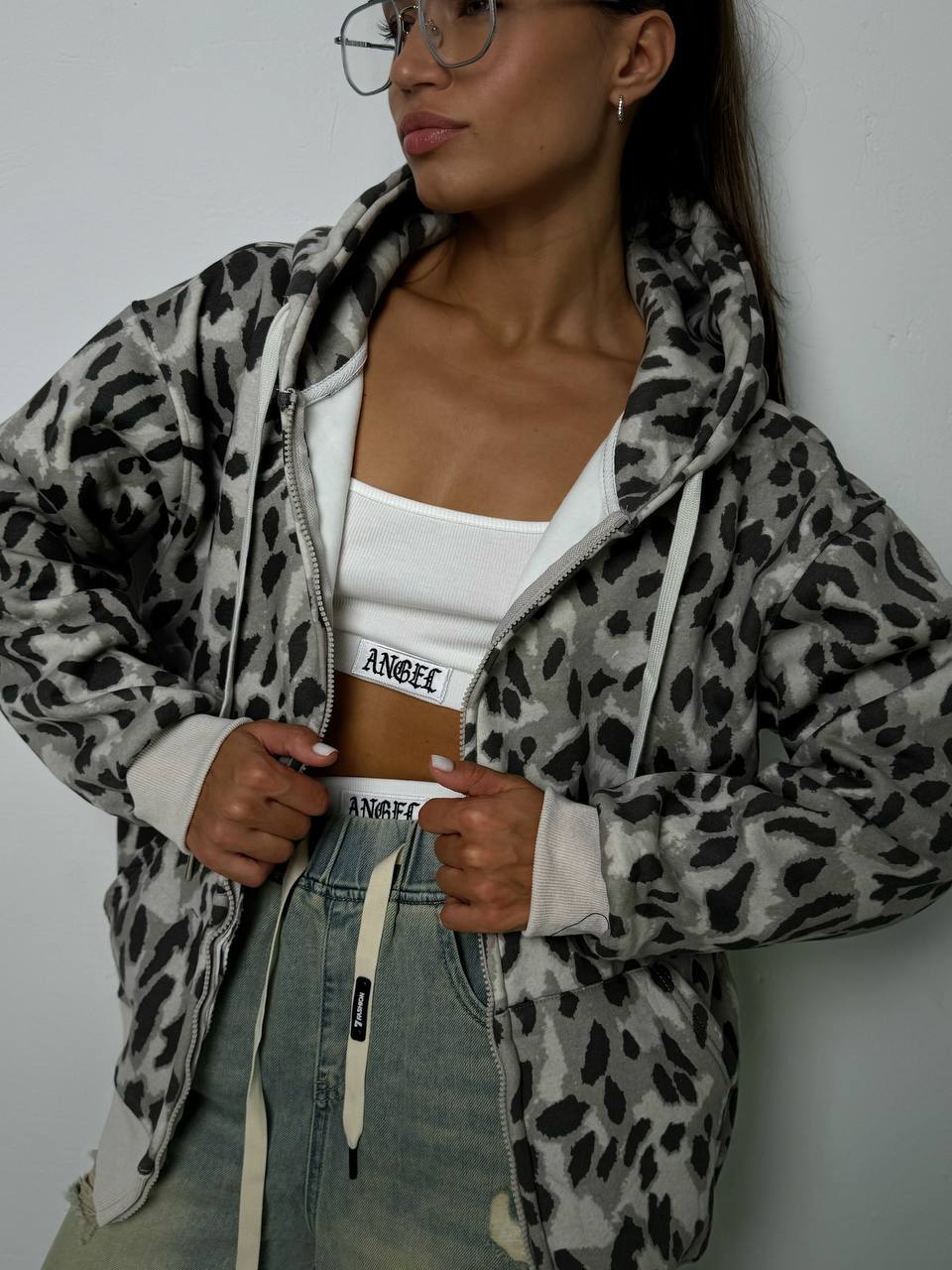 Women's hooded jacket with modern animal print and practical pockets NOVAE