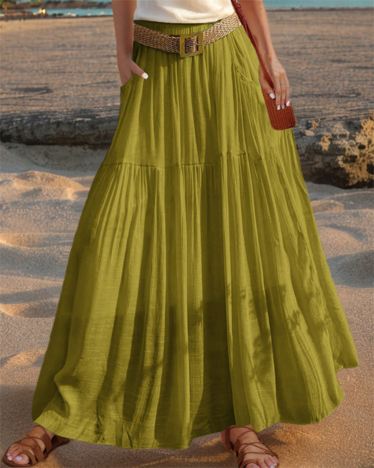 Women's wide-flared maxi skirt with elegant pleats and practical pockets NOVAE