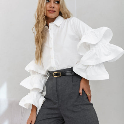 Women's blouse with voluminous ruffle details and classic collar NOVAE