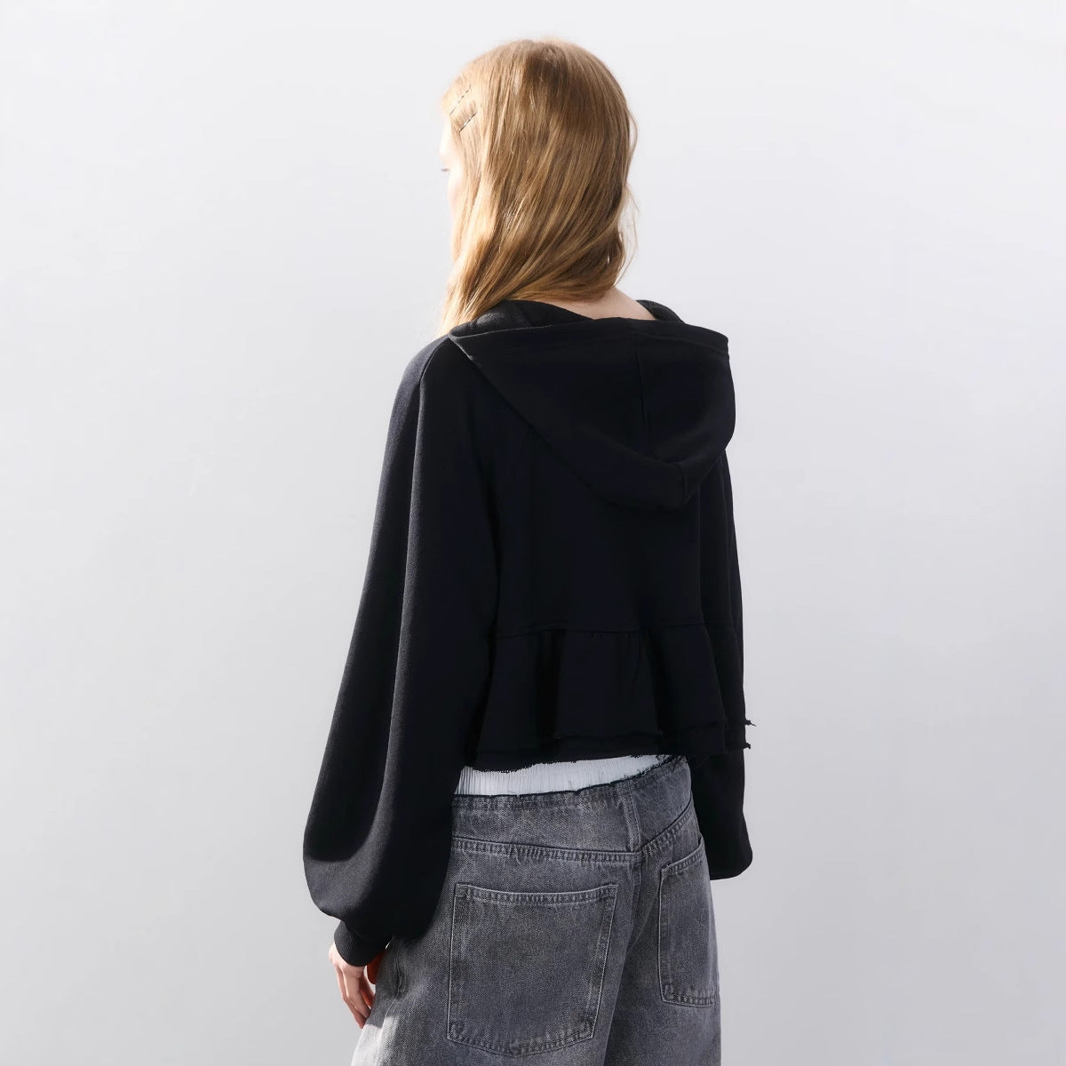 Women's cropped hooded jacket with playful ruffle design NOVAE