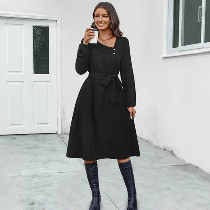 Women's midi dress with a tailored cut and elegant button details NOVAE