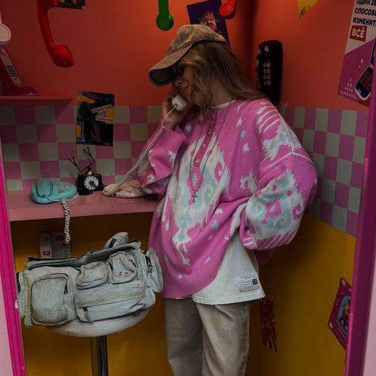 Women's knitted sweater with innovative pattern NOVAE