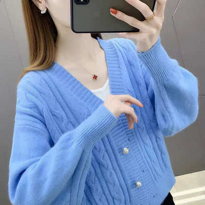 Women's cardigan with elegant cable knit pattern and high-quality button details NOVAE