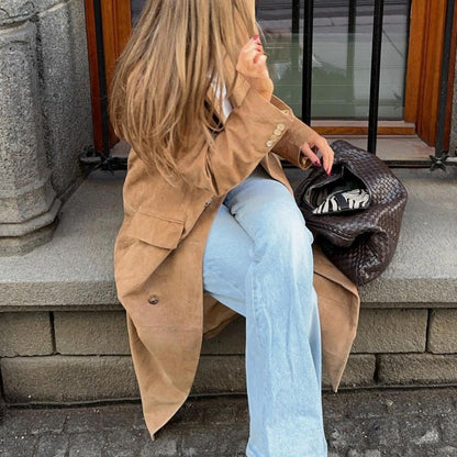 Women's elegant long coat with double button placket and practical pockets NOVAE