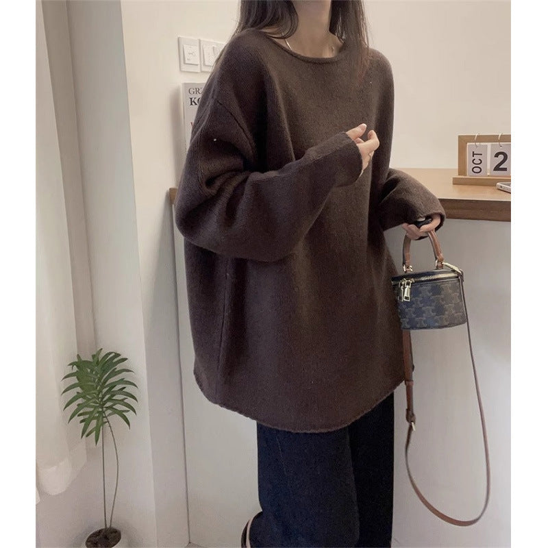 Women's oversized knit sweater with a relaxed fit and high collar NOVAE