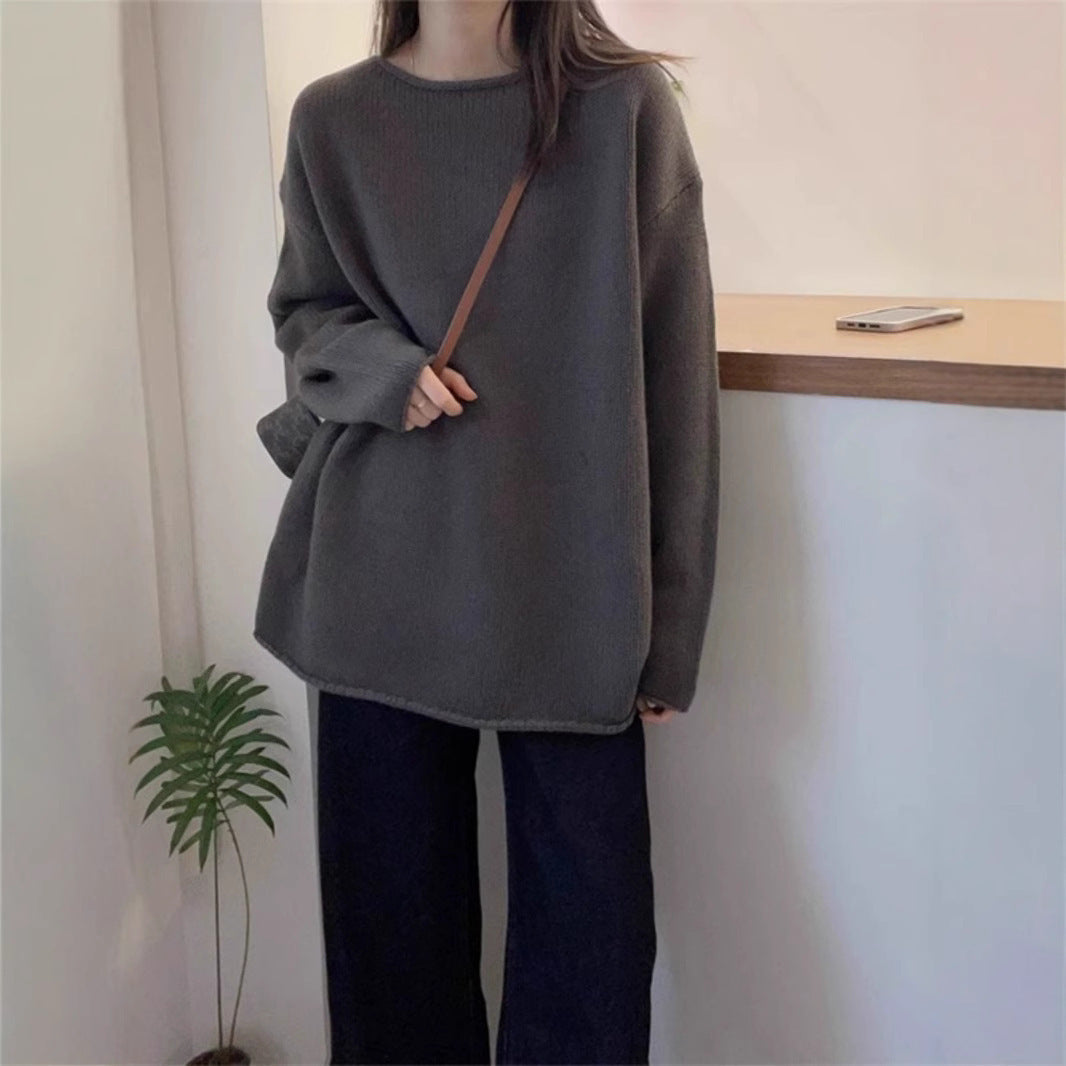 Women's oversized knit sweater with a relaxed fit and high collar NOVAE